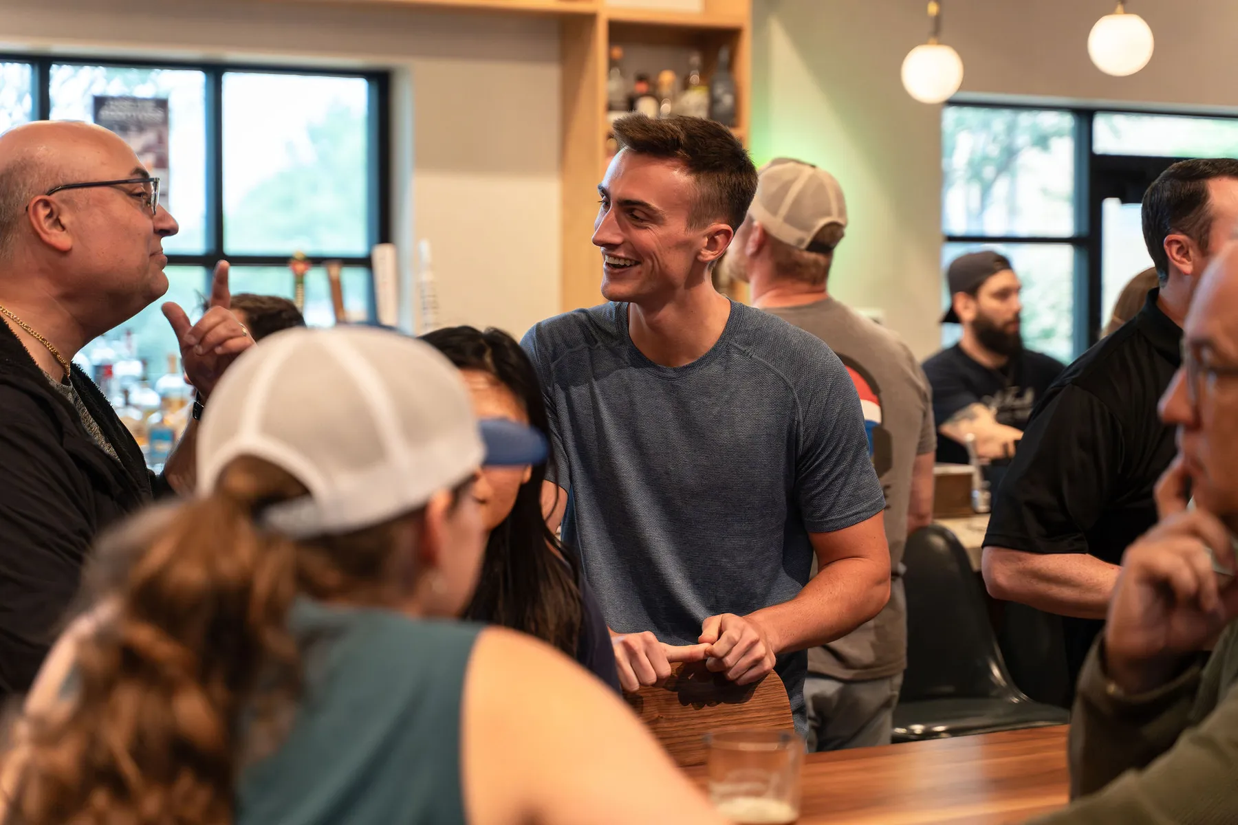 Bartender pouring a beer at At Fault